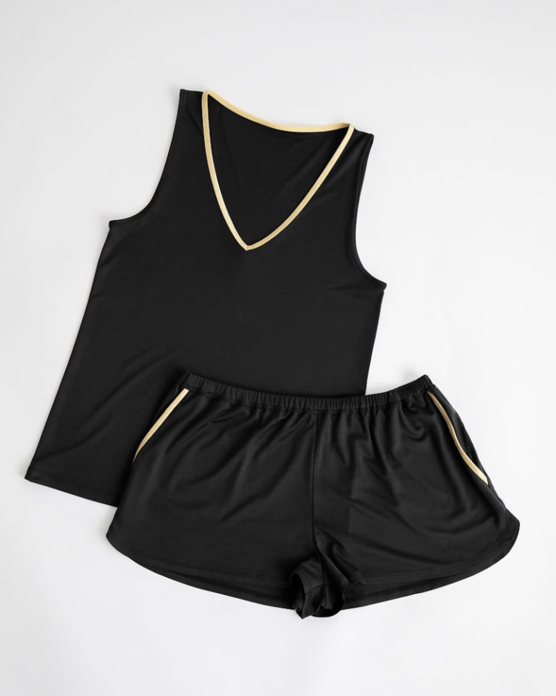 Front of a size Large Jess Lounge Shorts Set in Black/Gold by Uwila Warrior. | dia_product_style_image_id:242255